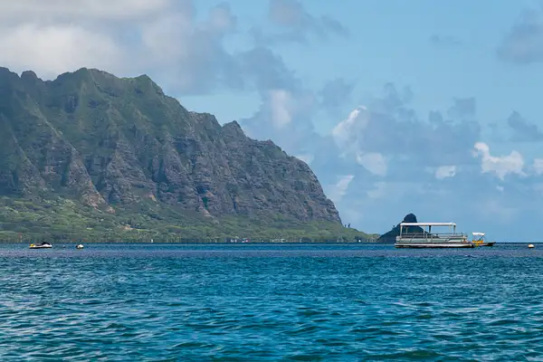 To the north we catch sight of Chinaman's Hat Island off...