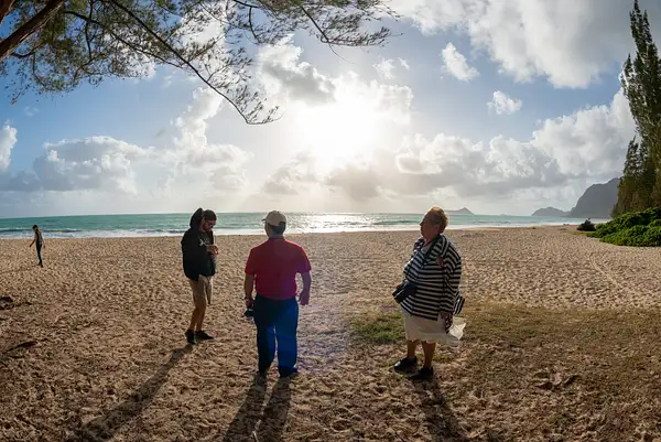 Preparing for a stroll on Waimanalo Beach. by Willis...