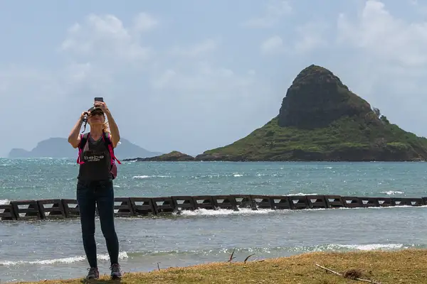 Peggy getting a photosphere of Kualoa Beach. by Willis...