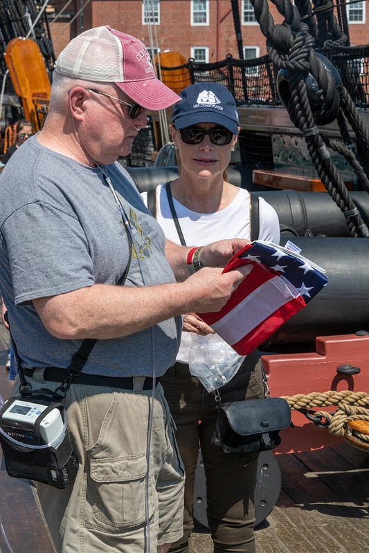 John gets to help fly an ensign over the Constitution.
