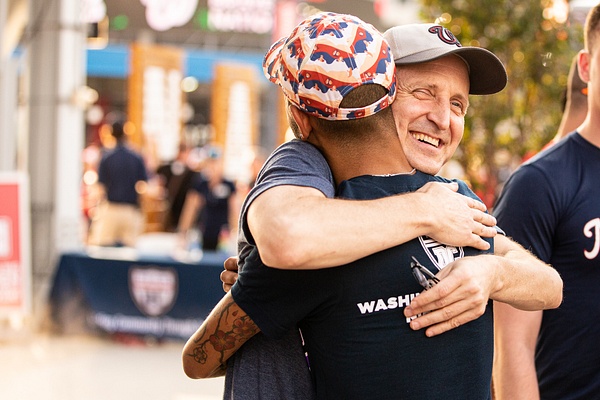 Photo of Men Embracing Each Other in DC - Connor McLaren Photography