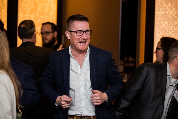 Man Laughing at an Event in DC - Connor McLaren Photography 