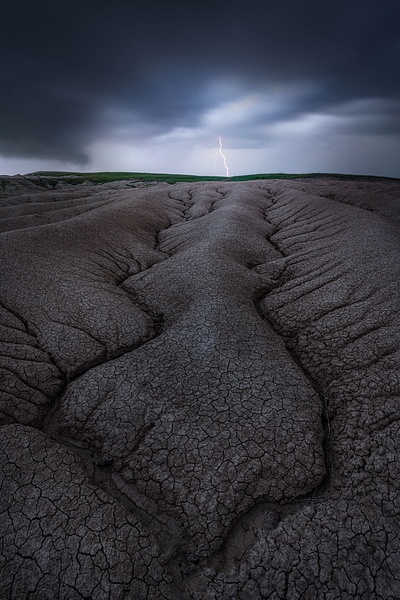 Lightning-strike-1,-Conata-Basin,-Badlands-National-Park,-South-Dakota,-USA - IAN PLANT
