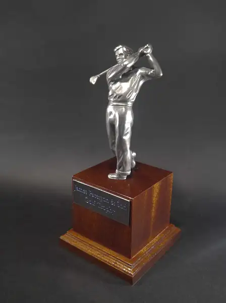 Silver golfer trophy by Louis Lejeune Ltd.