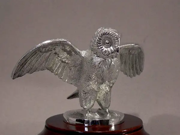 Solid Sterling silver Owl on mahogany plinth by Louis...
