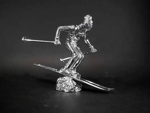Silver Skier Mascot by Louis Lejeune Ltd.