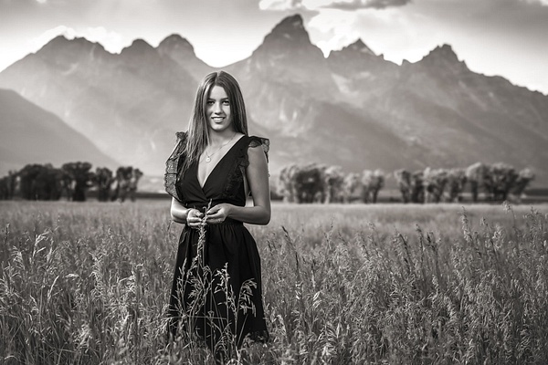 girl in front of teton in black dress - Flo McCall Photography 