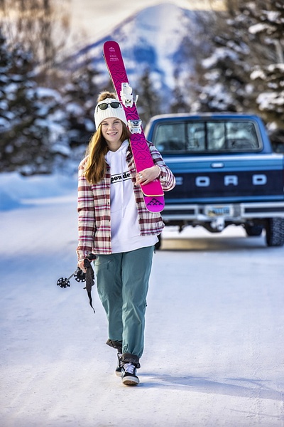 girl carrying skis - Flo McCall Photography