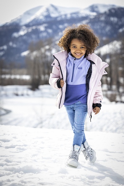 black young girl on snow - Flo McCall Photography