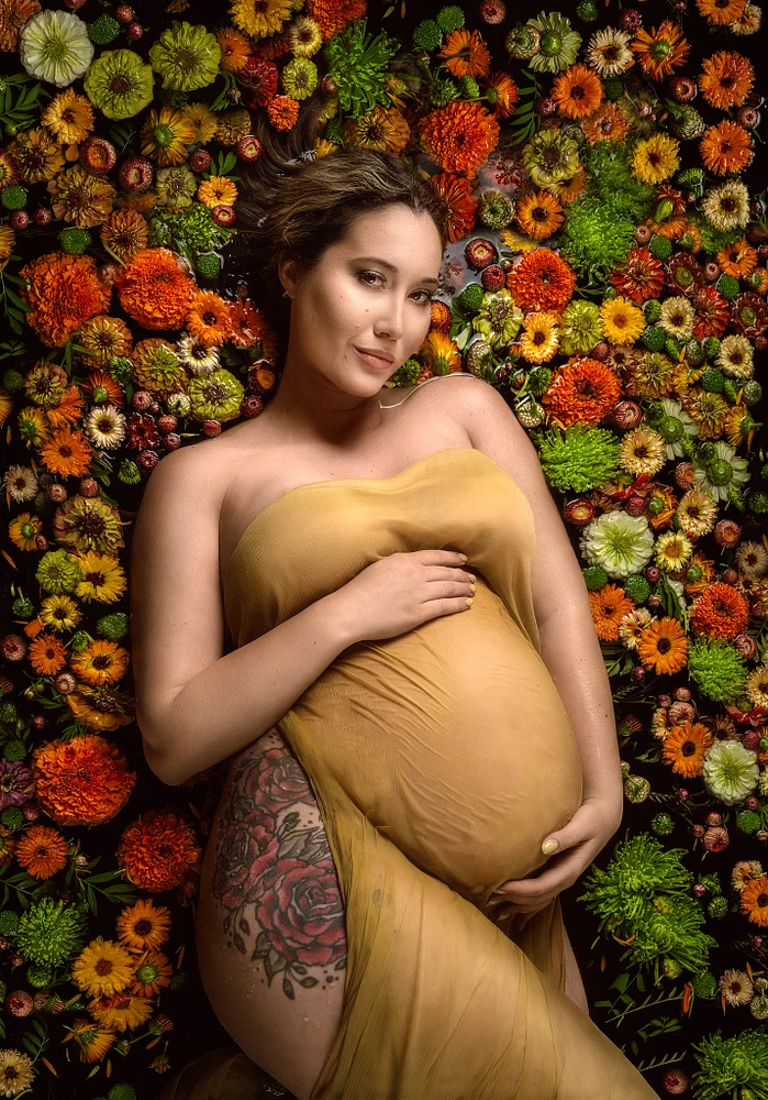Stunning Maternity Portrait Surrounded by Vibrant Flowers