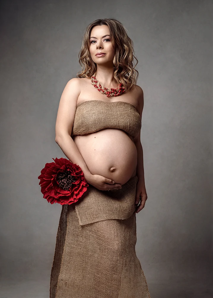 Elegant Maternity Portrait with Floral Accents