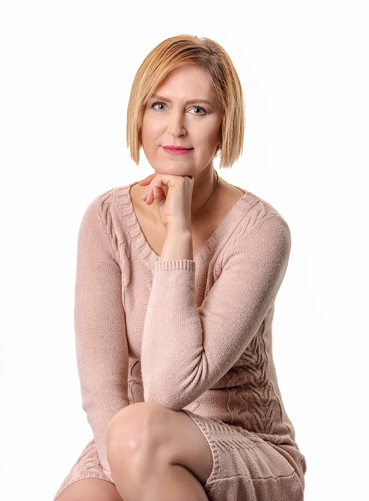 Elegant Portrait of a Woman in Soft Knitwear