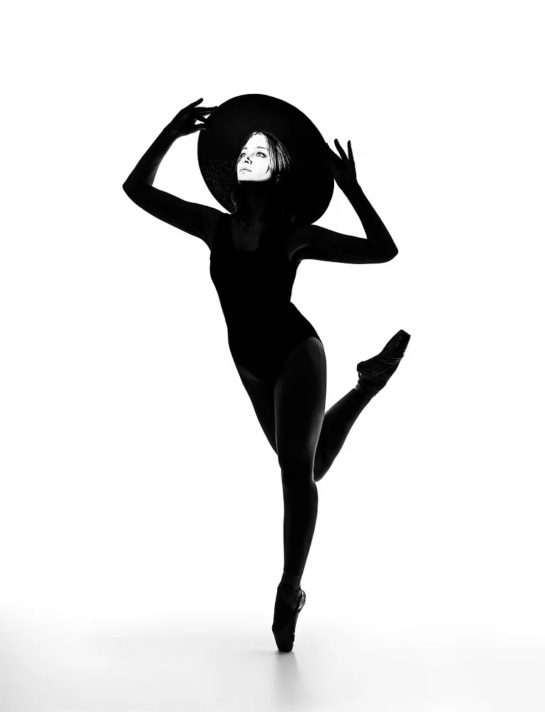 Elegant Ballet Silhouette with Wide-Brimmed Hat