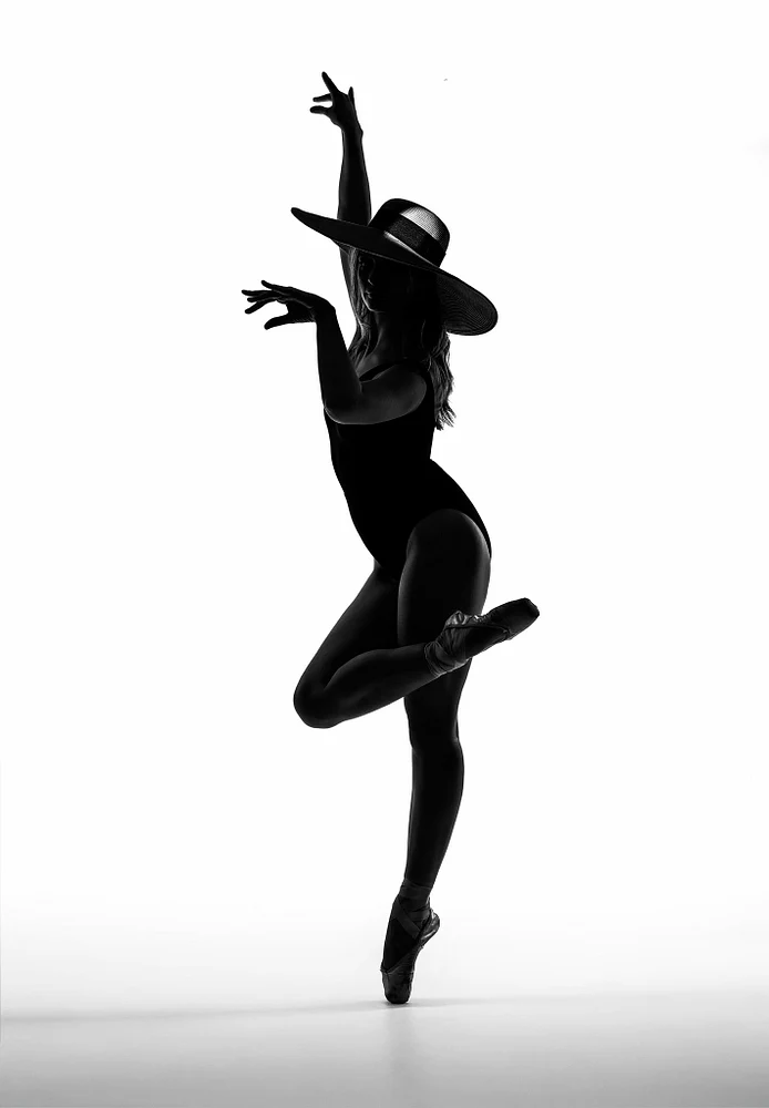 Striking Ballet Dancer Silhouette with Wide-Brimmed Hat