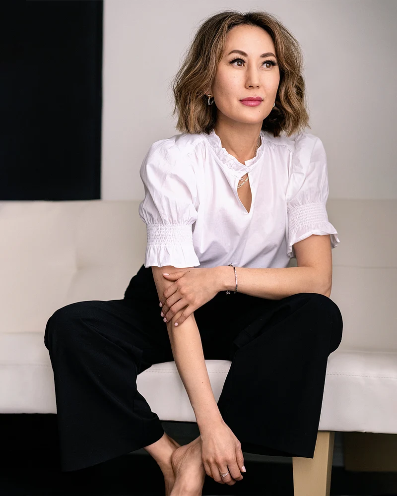 Elegant Portrait of a Woman in a Chic White Blouse
