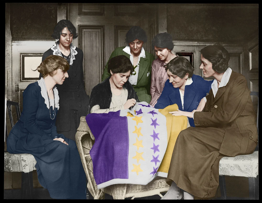 Alice Paul and women sewing the Suffrage flag