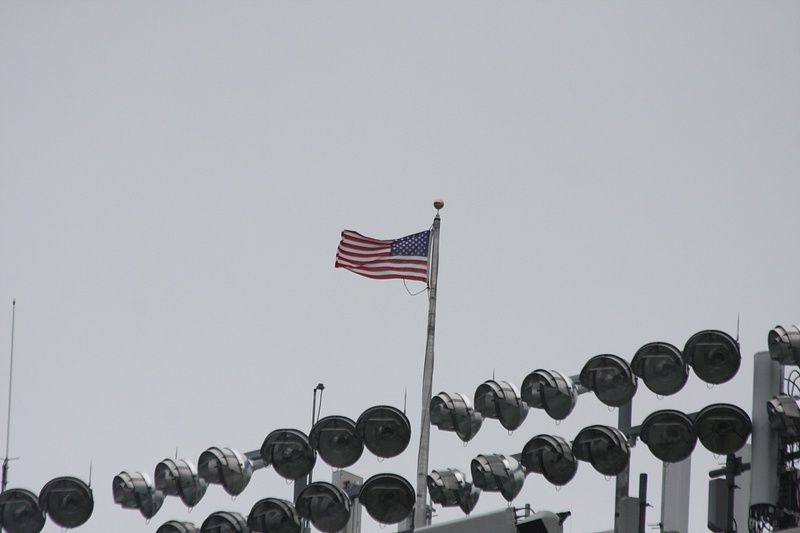 Old Glory snaps over Michie Stadium as the graduation ceremony rolls to a conclusion