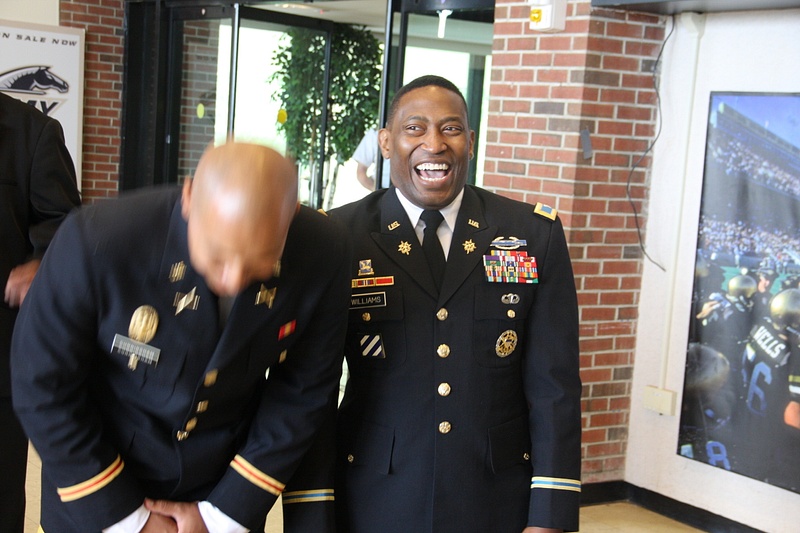 LT Cunningham and COL Williams share a laugh