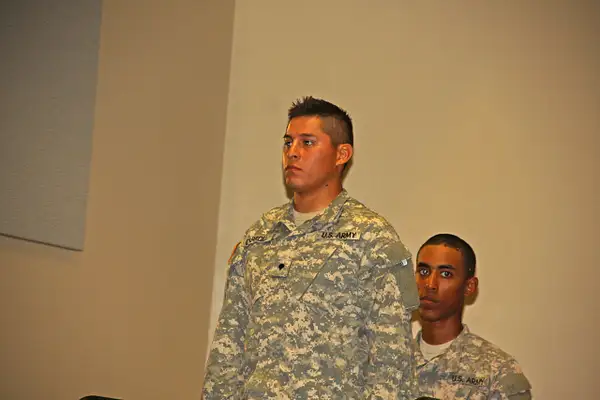 Gabe prepares to receive his Army PT Commendation and...