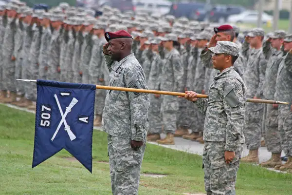 First Battalion, 507th Infantry Battalion salute their...