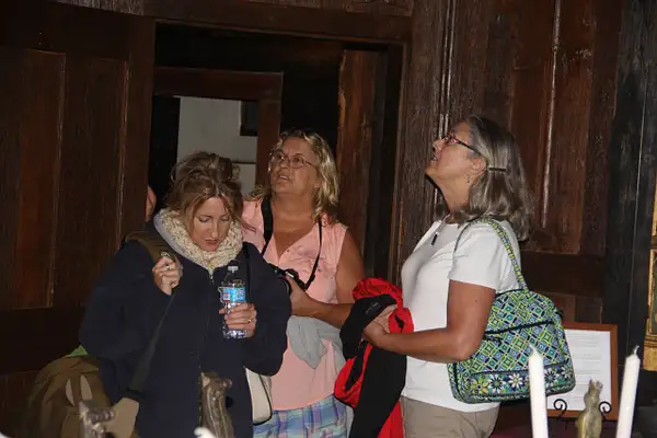 The girls enter Hammond Castle's dining room by...