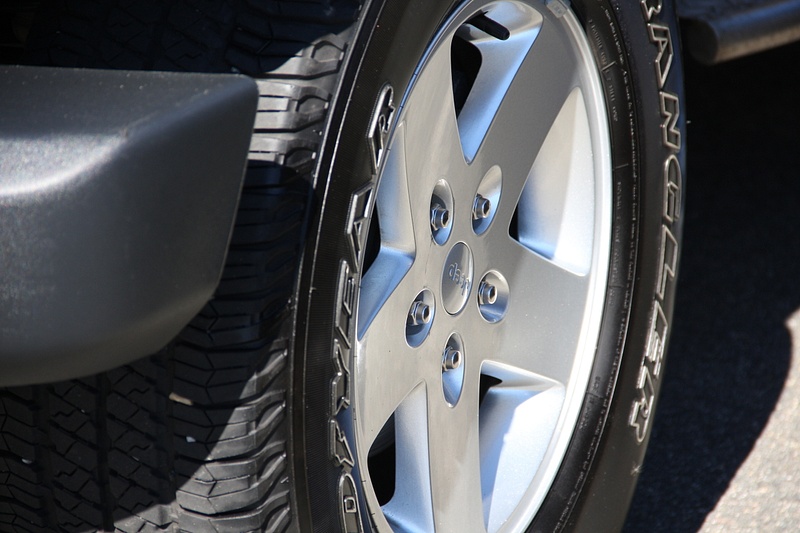 Sporty looking aluminum wheels on the 2011 desert camo model. Note high end Goodyear tires.