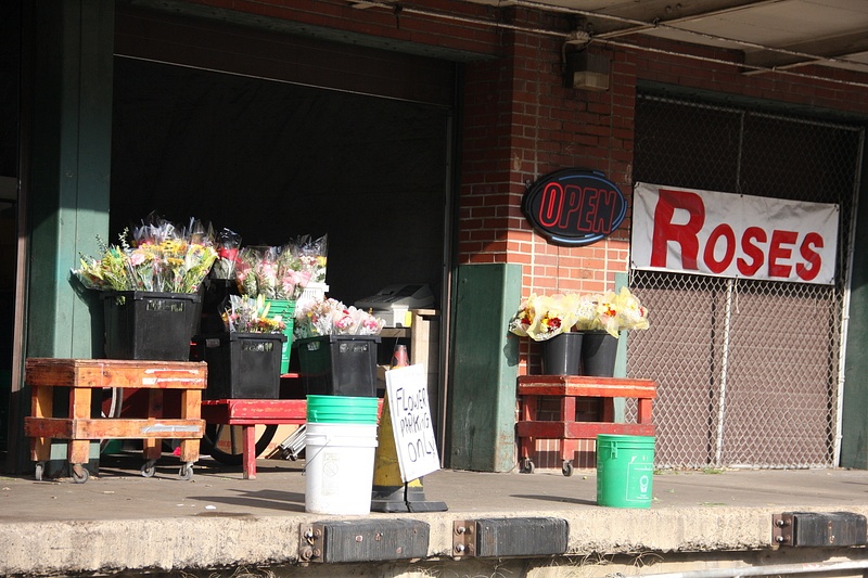 Flowers for sale from an old warehouse.