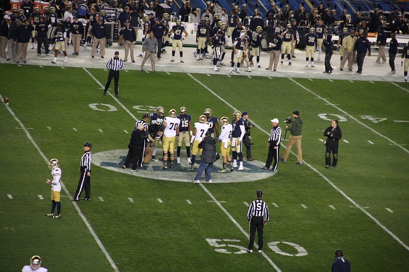 Captains meet for the coin toss