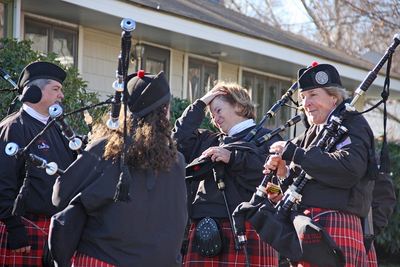 Pipers tune up befroe the parade