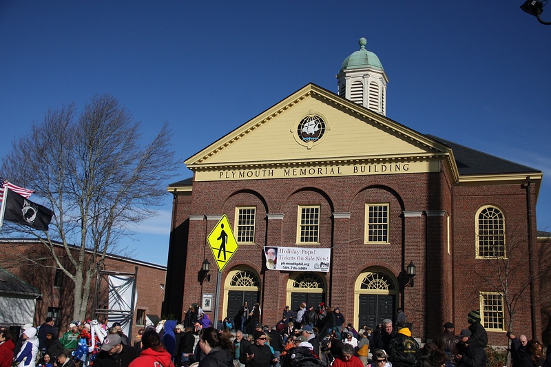 Crowds awaiting the parade at the Plymouth Memorial Building
