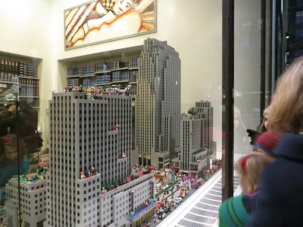 The kids are mesmerized by the Lego Store model of...