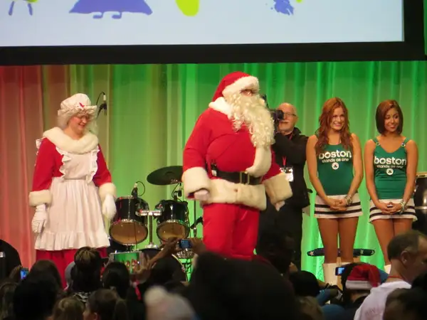 Mr and Mrs Claus and Celtic Cheerleaders by...