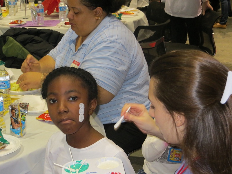 One of our beautiful young guests getting face painted