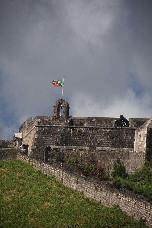 The St Kitts flag snaps over the Citadel