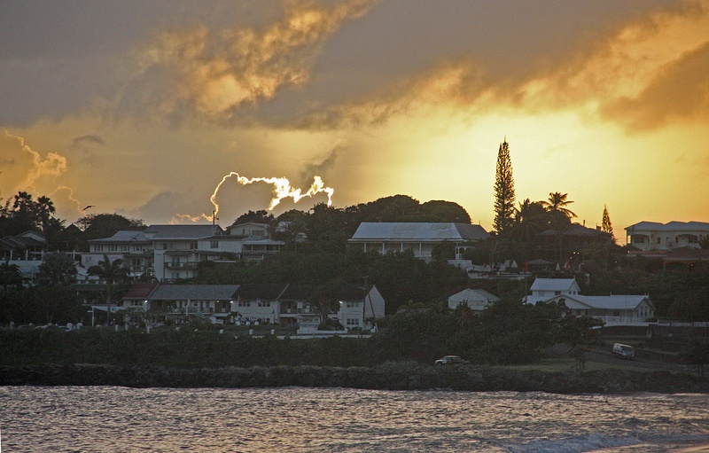 The sun sets behind the Ocean Terrace Inn