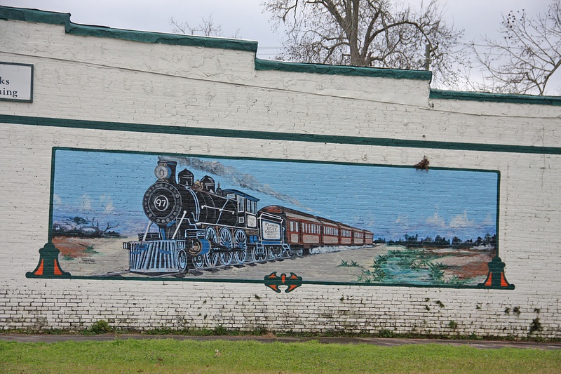 WIder view-Railroad mural recallin Trenton's days as a railroad stop
