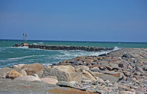 Breakwater at the entrance to Scituate Harbor by...