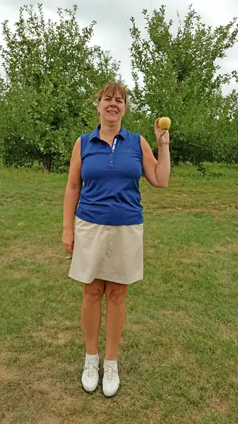Lee steals an apple from Lyman Orchards by...