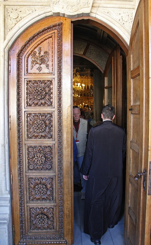 Entering the cathedral behind an Orthodox priest