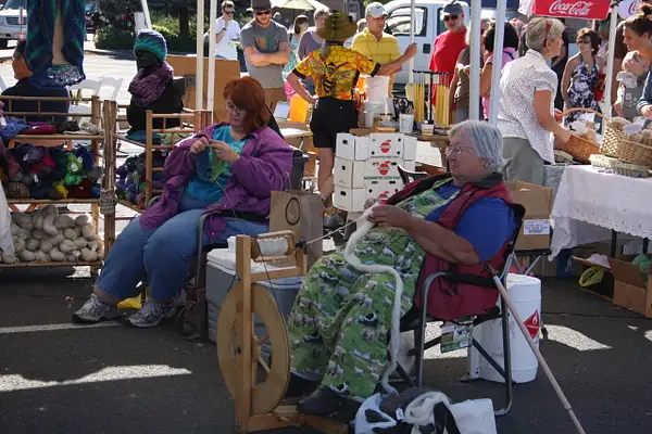 Craftswomen beaver away at the Farmers' Market by...
