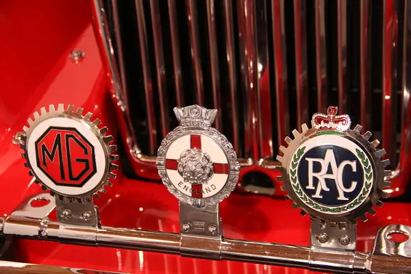 Detail-1952 MG TD-Ralley Badges, including the Royal...