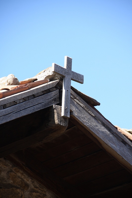 Simple wooden cross on the 15th Century Nativity Church, Arbanassi