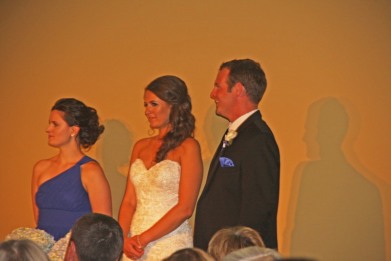The Maid of Honor, Bride and Groom look on as the  Best Man, Joe Sullivan, delivers his speech