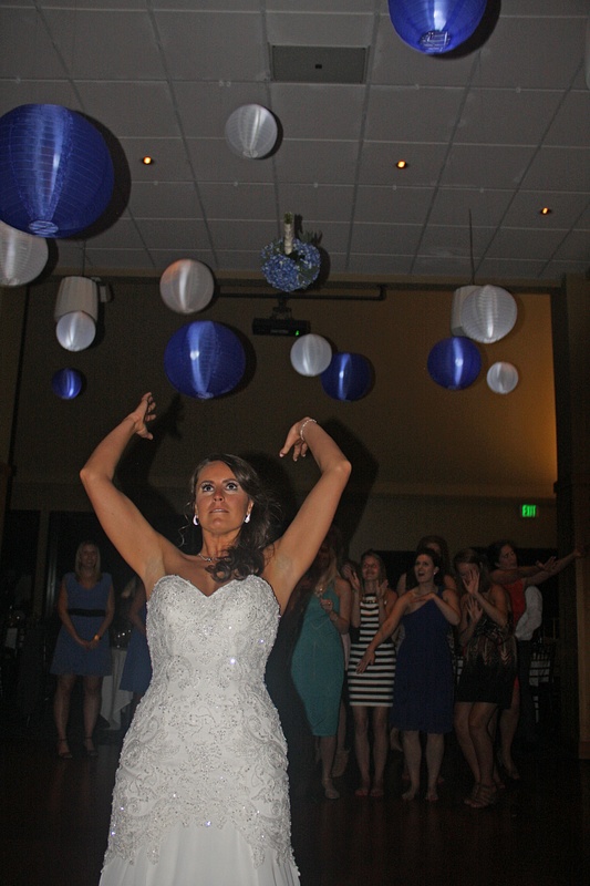 Bombs away! The bouquet is airborne!