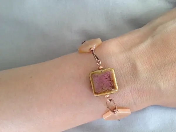 Peach_Aventurine_and_Ceramic_Copper_Bracelet by...
