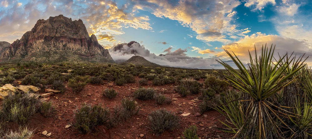 Dramatic Red Rocks Landscape Under Stormy Skies