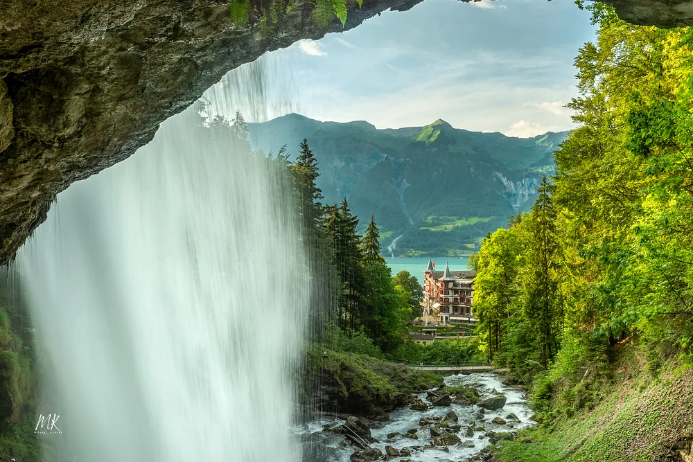 Majestic Waterfall View Near Swiss Castle