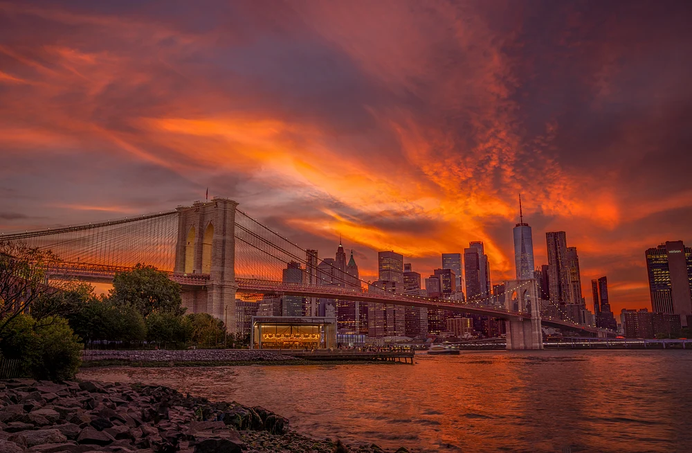Dramatic Sunset Over Brooklyn Bridge and Cityscape