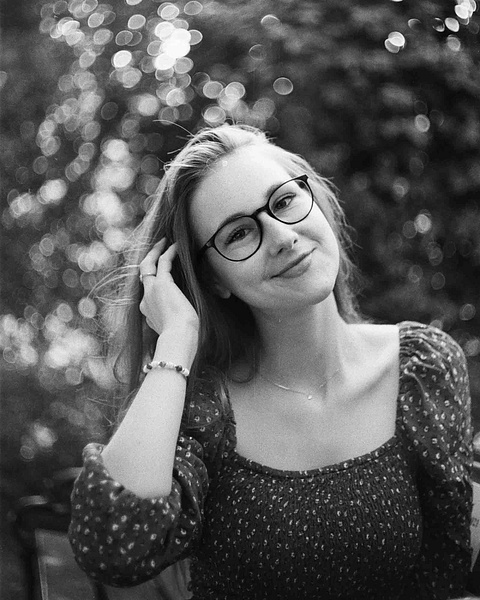 Film Photographer in North Alabama - Renaissance Photo - Elegant film portrait of woman with bokeh - Home screen - Renaissance Photo