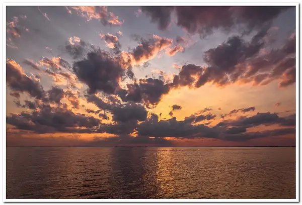 2021 Sunset on Lake Michigan at Peninsula Point Light in...